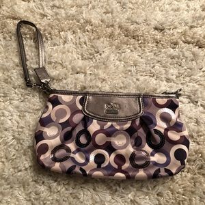 Coach wristlet- never used. Shades of purple